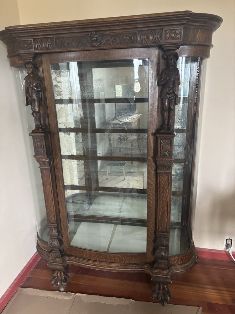 Unique and Unusual Curved Glass China Cupboard with Carved Figures C.1900