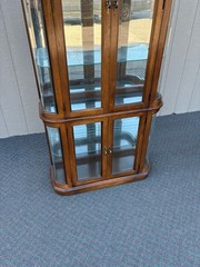 67590 Pulaski Lighted Curio Cabinet with Bowed Glass Doors
