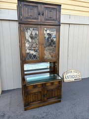 67410 Mid-Century Oak Cabinet with Desk and Leaded Glass Doors