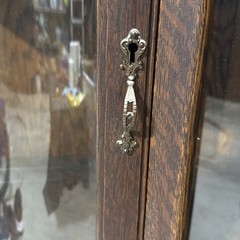 Antique Tiger Oak Corner Curio Cabinet. Ornate details, curved glass doors.
