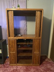 Vintage wooden entertainment center or display cabinet. Oak. Working tambour.