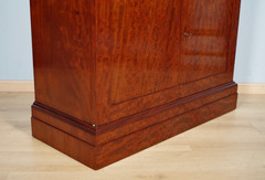 Empire-style chest of drawers with doors in moiré mahogany, circa 1810