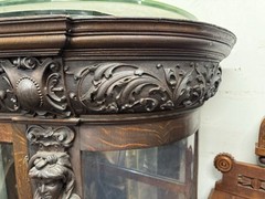 A. J. JOHNSON CARVED OAK CHINA CABINET