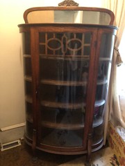 Antique China Cabinet with curved glass and clawed feet !
