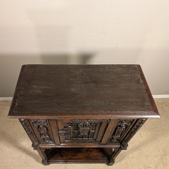 Antique French Gothic Carved Oak Cabinet Stand with Figural Panels Heraldic Door