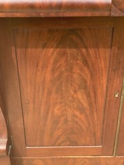 ANTIQUE EMPIRE CROTCHED MAHOGANY JELLY CUPBOARD WITH DOUBLE DOORS & OGEE DRAWERS