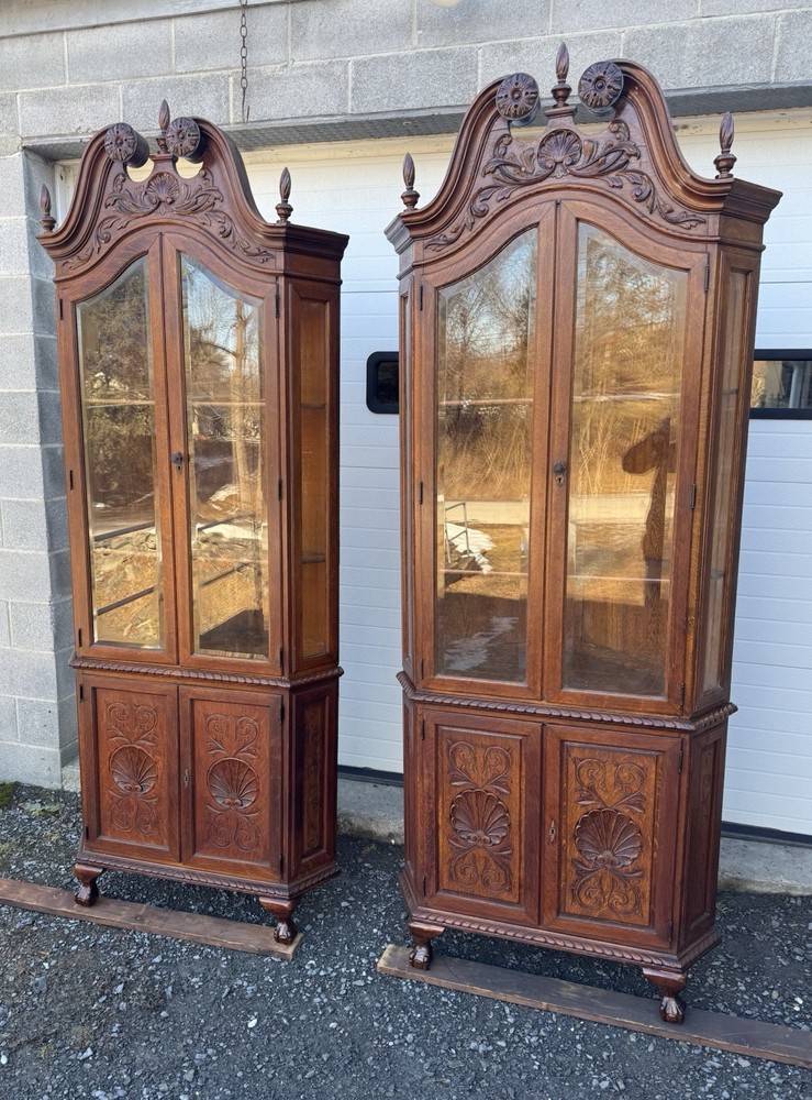 PAIR OF VICTORIAN OAK CHIPPENDALE BEVELED GLASS CORNER CHINA CABINETS