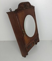 Gorgeous Medicine Apothecary Cabinet Oval beveled glass mirror hand carved wood