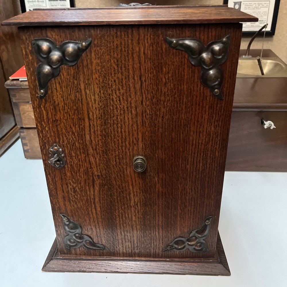 Large Antique Oak Smokers Cabinet. in vgc for age with working lock and key