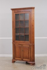 73584: Bench Made Chippendale Style Walnut Corner Cabinet