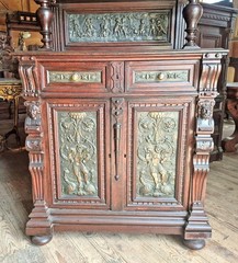 VICTORIAN OAK CABINET W FIGURAL BRASS PANELS