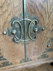 Oriental Vintage Cabinet with Brass Hardware.