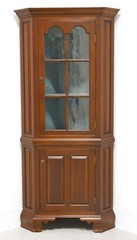 D. R. Dimes Chippendale style cherry 2-part corner cupboard benchmark series