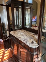 antique hutch cabinet – marble top, beveled glass doors and beveled mirror.