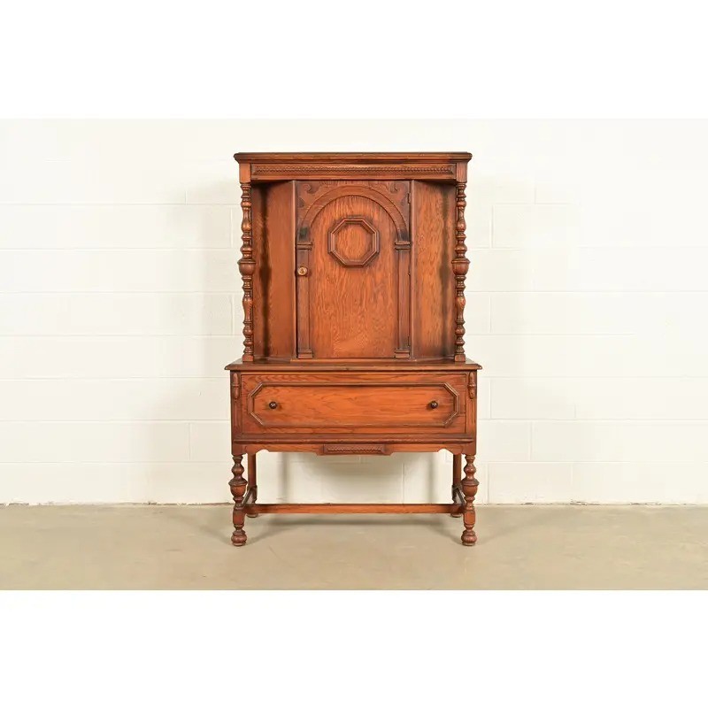 Antique English Jacobean Carved Oak Bar Cabinet, Circa 1920s