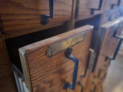 Antique, solid oak card catalog cabinet with 40 individual drawers