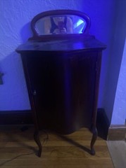 Antique mahogany music cabinet