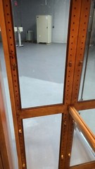 used lighted curio cabinet glass with bevel edge around the glass