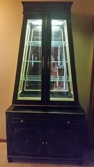 Unusual Shaped Black Lacquer 2 Piece China Cabinet Slender W/ Light & Gold Rope