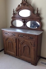 Antique Wooden Breakfront Cabinet with Mirror and Ornate Detailing