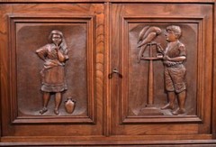 Antique French Cabinet Highly Carved Chestnut Wood w/Boy Girl and Bird (Macaw)