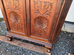 PAIR OF VICTORIAN OAK CHIPPENDALE BEVELED GLASS CORNER CHINA CABINETS