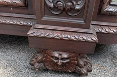 ORIEL CABINET CO. CARVED MAHOGANY MAN FIGURE CHINA CABINET