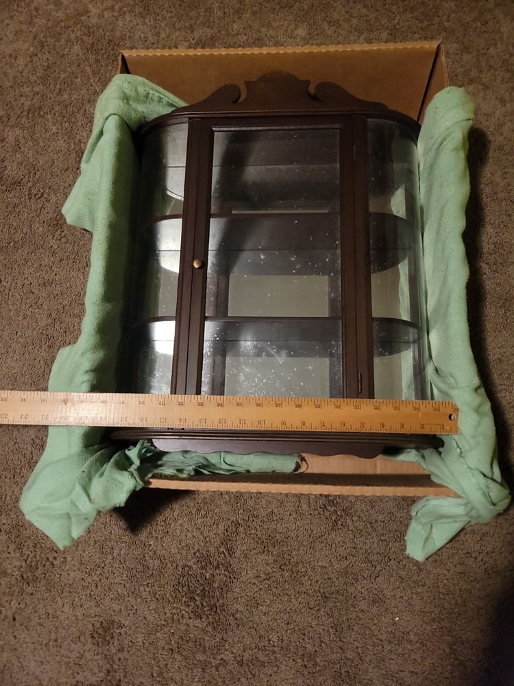1940’s small curved curio cabinet