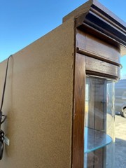 67589 Pulaski Lighted Curio Cabinet with Bowed Glass Doors