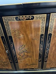 Drexler 1970’s chinoisserie style bar/cabinet on wherls.