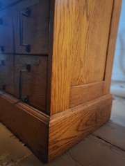 Antique, solid oak card catalog cabinet with 40 individual drawers