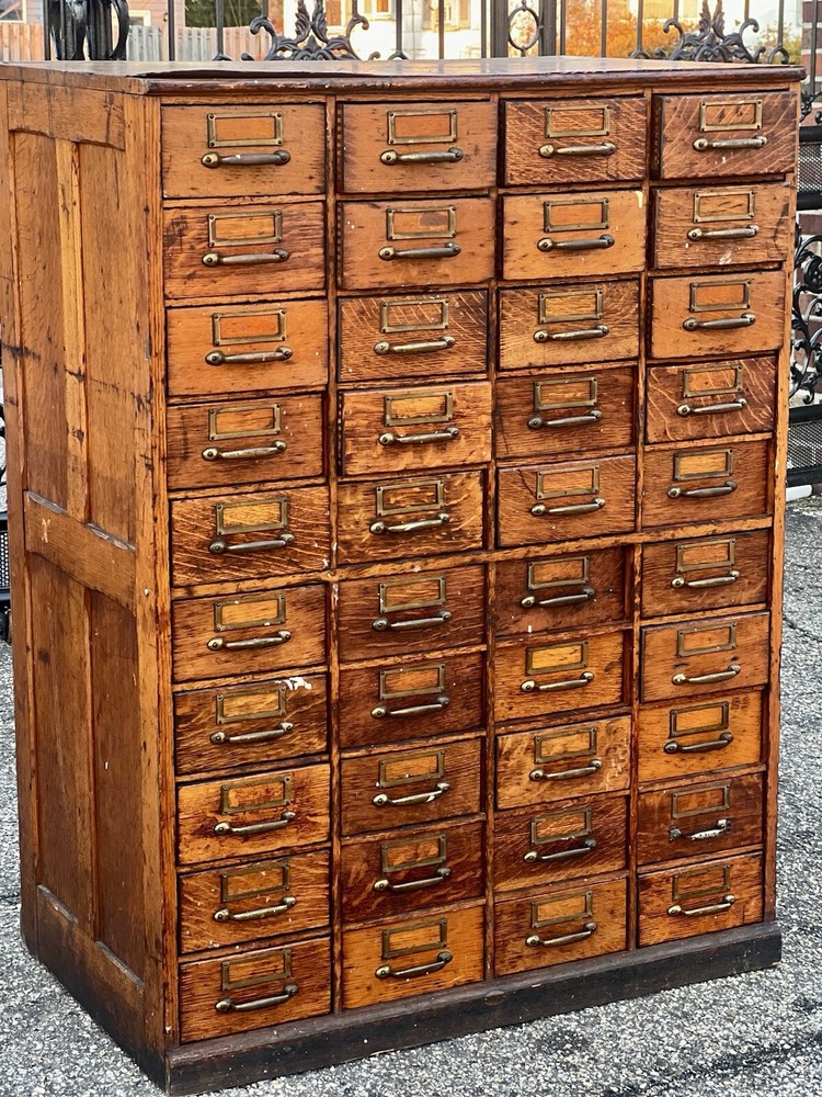 Large solid wood, antique multi drawer card catalog cabinet