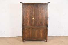 Baker Furniture French Provincial Louis XV Carved Oak Lighted Bar Cabinet, 1960s