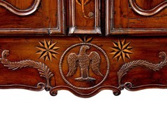 18TH CENTURY CARVED FRENCH YEW AND CHESTNUT ARMOIRE