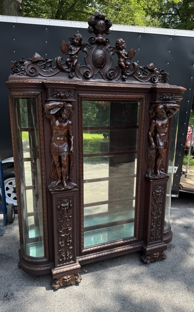 ORIEL CABINET CO. CARVED MAHOGANY MAN FIGURE CHINA CABINET