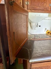 antique oak hoosier cabinet 69″ x 41.5″ with many accessories