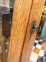 Antique Tiger Oak Bow-Front Curio Cabinet with Curved Glass and Key