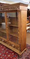 Late 19th Century Figural Carved Tiger Oak China Cabinet By AJ Johnson Chicago
