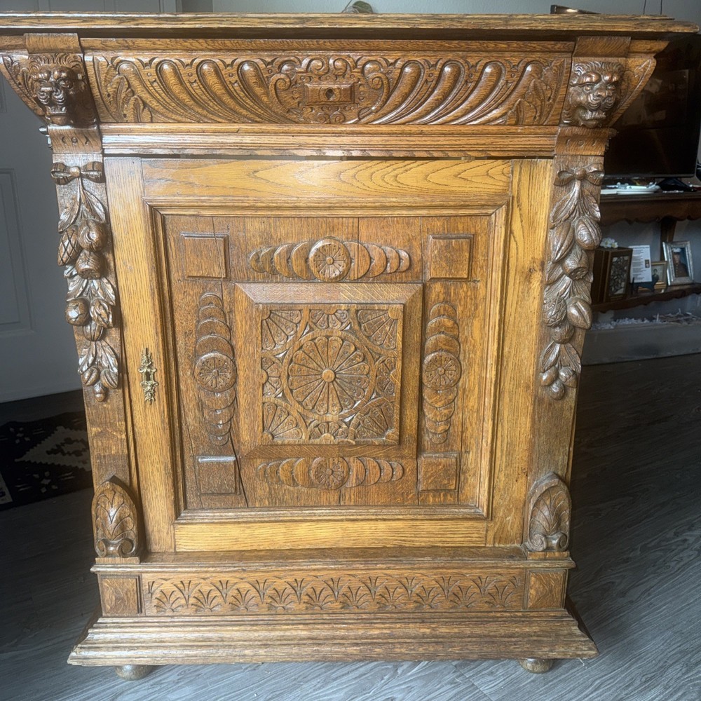 Antique French Oak Floor Cabinet with Drawer. Carved Lions Heads and Fruit