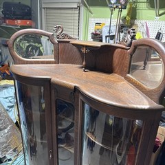 Antique Tiger Oak Corner Curio Cabinet. Ornate details, curved glass doors.