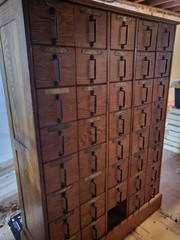 Antique, solid oak card catalog cabinet with 40 individual drawers