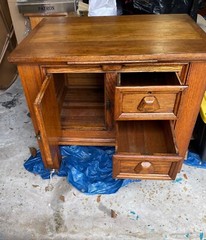 Antique solid oak kitchen island / cabinet; two drawers, & cutting board; $200