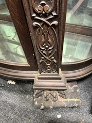 A. J. JOHNSON CARVED OAK CHINA CABINET