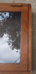Antique wood and glass display cabinet