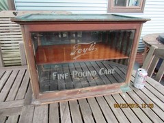 FEYL’S FINE POUND CAKE ADVERTISING WOODEN DISPLAY CUPBOARD 1897 SCHWANBECK BROS.