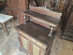 VICTORIAN OAK CABINET W FIGURAL BRASS PANELS