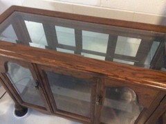solid oak curio cabinet glass shelf glass and mirrored