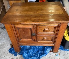 Antique solid oak kitchen island / cabinet; two drawers, & cutting board; $200