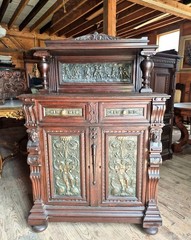 VICTORIAN OAK CABINET W FIGURAL BRASS PANELS