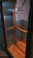 used lighted curio cabinet glass with bevel edge around the glass